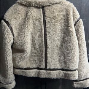 American Eagle Outfitters white label on brown trim